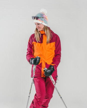 Oxygène Ecole de Ski & Snowboard femme avec des bâtons